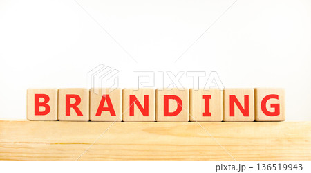 Branding brand word symbol. Concept word Branding on beautiful wooden blocks on wooden beam. Beautiful white background. Business support help branding brand word concept. Copy space. 136519943