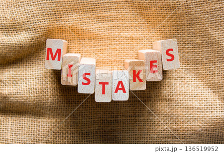 Mistakes mistake word symbol. Concept word Mistakes on beautiful wooden blocks. Beautiful canvas background. Business support help mistakes mistake word concept. Copy space. 136519952