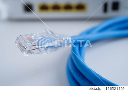 Ethernet cable with wireless router connect to internet service provider network. 136521393
