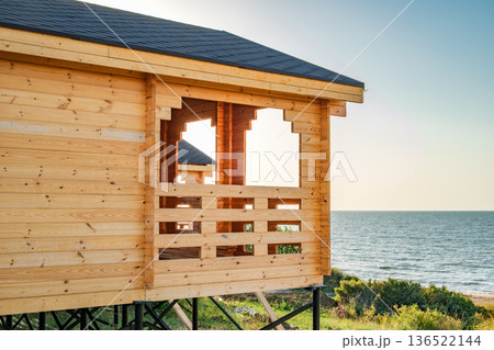 balcony of wooden cottage by the sea balcony of wooden cottage by the sea 136522144