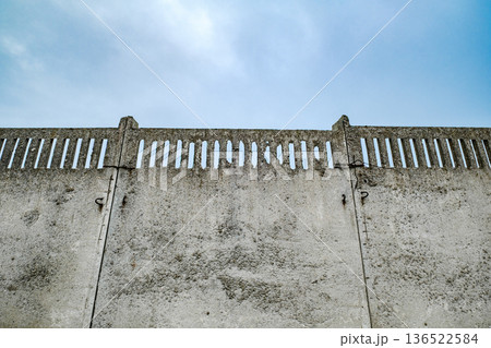 concrete sectional solid fence against the sky concrete sectional solid fence against the sky 136522584