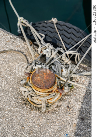 Close-Up of Mooring Bollard with Yacht Rope Close-Up of Mooring Bollard with Yacht Rope 136522800