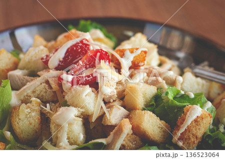 classic Caesar salad, close-up, natural light, selective focus, horizontal, 136523064