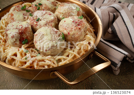 spaghetti with chicken meatballs, with cream sauce, and parmesan cheese, and decorated with microgreens, homemade, no people, 136523074