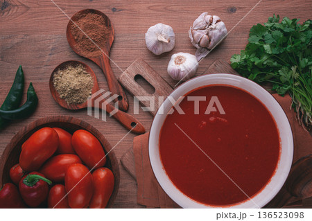Georgian sauce, Satsebeli sauce, tomato and sweet pepper sauce, with spices, on a wooden table, homemade, no people, Georgian sauce, Satsebeli sauce, tomato and sweet pepper sauce, with spices, on a wooden table, homemade, no people, 136523098