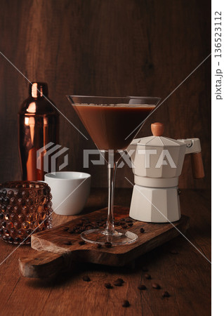 espresso martini cocktail, alcoholic drink, shaker and geyser coffee maker, on a wooden background, 136523112
