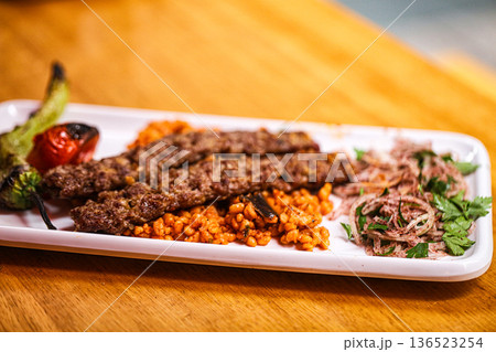 Turkish adana kebab with vegetables Turkish adana kebab with vegetables 136523254