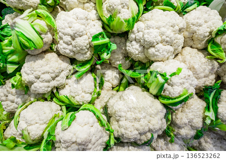 fresh cauliflower in bulk in supermarket 136523262