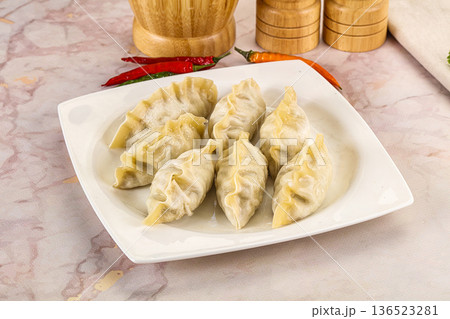 Japanese steamed Gyoza stuffed dumplings 136523281