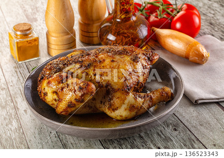 Baked in oven whole chicken with spices Baked in oven whole chicken with spices 136523343