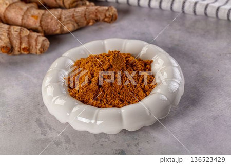 Indian spices - Curry powder heap Indian spices - Curry powder heap 136523429