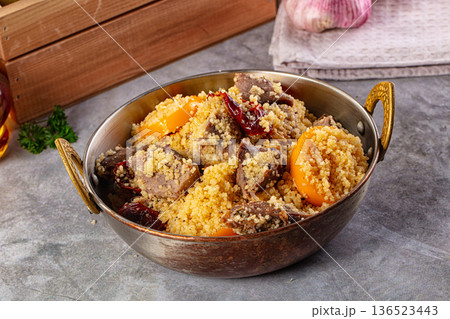 Traditional couscous with lamb and vegetables 136523443