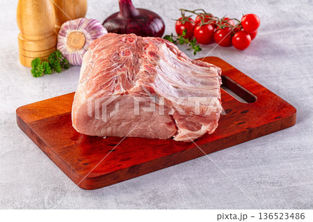 Raw pork loin with bone Raw pork loin with bone 136523486