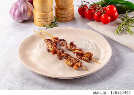 Yakitori - grilled chicken skin skewer Yakitori - grilled chicken skin skewer 136523495