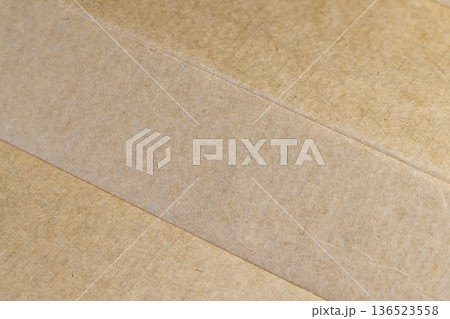 solid yellow cardboard for packaging goods and products, a part of corrugated cardboard for packaging goods 136523558