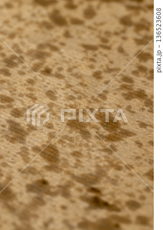 sunflower oil stains on packaging paper after the paper contained crispy potato chips that were deep fried sunflower oil stains on packaging paper after the paper contained crispy potato chips that were deep fried 136523608