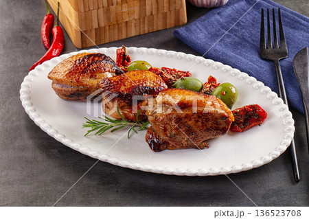 Roasted duck medallion with dry tomato 136523708