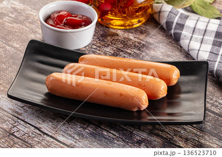 Boiled sausages with ketchup Boiled sausages with ketchup 136523710