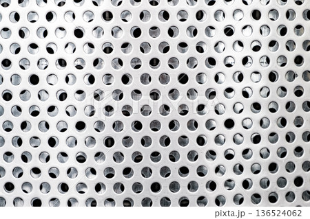 metal grating background with round holes 136524062