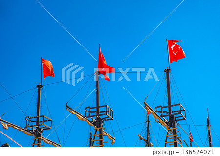 Turkish flags on the masts of the ship Turkish flags on the masts of the ship 136524071