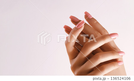 Beautiful Woman Hands. Soft skin, skincare concept. Hand Skin Care. Female Hands Applying Cream or Lotion. Spa and Manicure concept. Female hands with tender pink manicure Beautiful Woman Hands. Soft skin, skincare concept. Hand Skin Care. Female Hands Applying Cream or Lotion. Spa and Manicure concept. Female hands with tender pink manicure 136524106