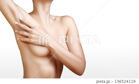 Woman Torso Covering Chest With Hand, Sweat Protection with Deodorant, Depilation, Hair Removal, Smooth Skin, Skincare Model Pose Suggesting Self Examination And Body. Women Health, Daily Hygiene Woman Torso Covering Chest With Hand, Sweat Protection with Deodorant, Depilation, Hair Removal, Smooth Skin, Skincare Model Pose Suggesting Self Examination And Body. Women Health, Daily Hygiene 136524119