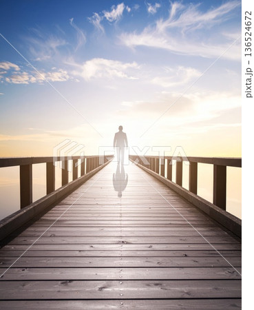 Man standing on a long bridge or road, loneliness and meditation concept 136524672