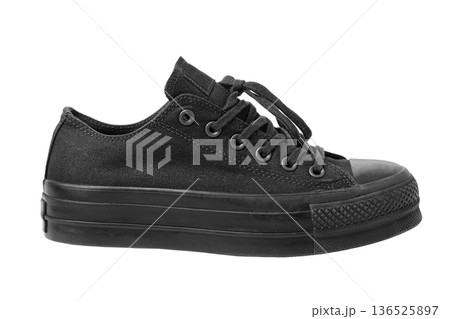 Black canvas platform sneakers with laces, transparent background 136525897