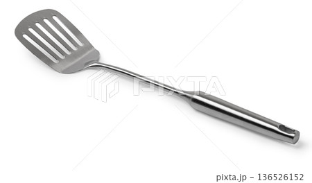 Stainless steel slotted spatula cooking kitchen utensil isolated Stainless steel slotted spatula cooking kitchen utensil isolated 136526152