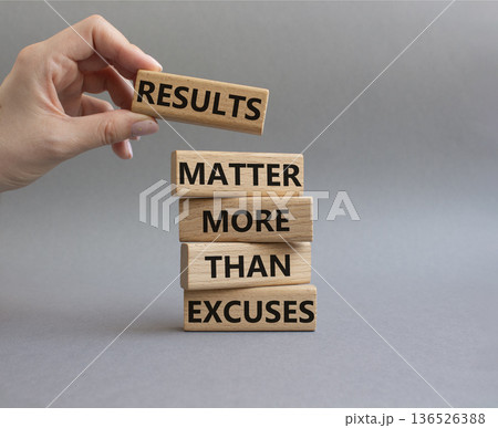 Results symbol. Wooden blocks with words Results Matter More Than Excuses. Businessman hand. Beautiful grey background. Business and Results concept. Copy space Results symbol. Wooden blocks with words Results Matter More Than Excuses. Businessman hand. Beautiful grey background. Business and Results concept. Copy space 136526388