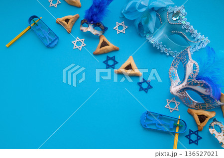 Purim celebration with hamantaschen, masks, graggers, david stars Purim celebration with hamantaschen, masks, graggers, david stars 136527021