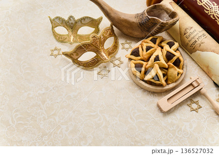 Purim celebration items with hamantaschen, masks, esther scroll Purim celebration items with hamantaschen, masks, esther scroll 136527032