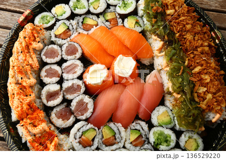 Assorted Sushi Platter on Elegant Plate Assorted Sushi Platter on Elegant Plate 136529220
