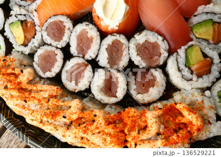 Assorted Sushi Platter on Elegant Plate Assorted Sushi Platter on Elegant Plate 136529221