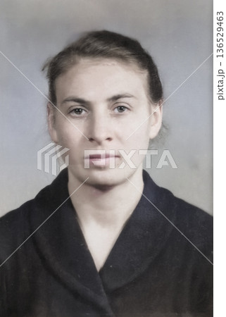 Vintage portrait of a serious young woman. Retro photo, 1962. Vintage portrait of a serious young woman. Retro photo, 1962. 136529463