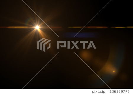Natural Sun flare on the black. Solar lens flare. Natural Sun flare on the black. Solar lens flare. 136529773