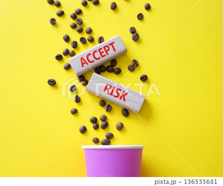 Accept Risks symbol. Concept words Accept Risks on beautiful wooden picture frame. Beautiful yellow background with coffee cup and coffee beans. Business and Accept Risks concept. Copy space. Accept Risks symbol. Concept words Accept Risks on beautiful wooden picture frame. Beautiful yellow background with coffee cup and coffee beans. Business and Accept Risks concept. Copy space. 136535681