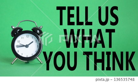 Tell us what you think symbol. Wooden blocks with words Tell us what you think. Beautiful green background with alarm clock. Business and Tell us what you think concept. Copy space. Tell us what you think symbol. Wooden blocks with words Tell us what you think. Beautiful green background with alarm clock. Business and Tell us what you think concept. Copy space. 136535748