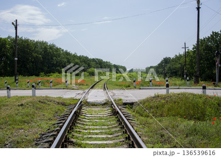 A fragment of a railroad track with rails A fragment of a railroad track with rails 136539616