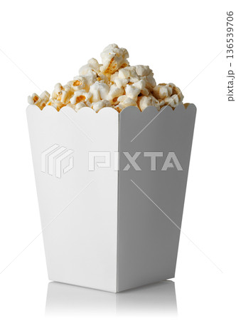 Popcorn in paper bucket isolated on white background 136539706