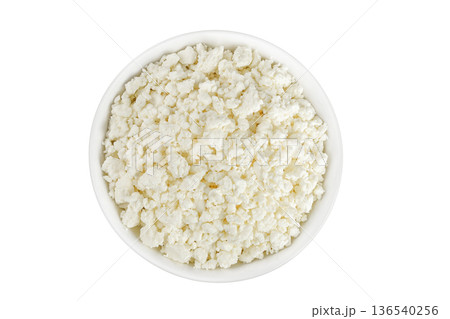Cottage Cheese, Curd in ceramic bowl isolated on white background. Top view. Flat lay 136540256