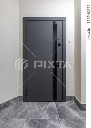 Minimalist Dark Grey Entrance Door in Modern Apartment Minimalist Dark Grey Entrance Door in Modern Apartment 136540831