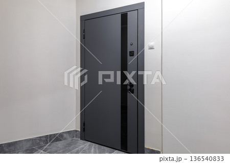 Minimalist Dark Grey Entrance Door in Modern Apartment Minimalist Dark Grey Entrance Door in Modern Apartment 136540833