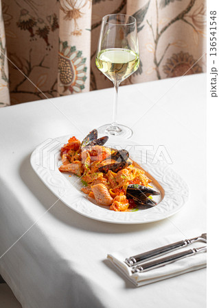 Seafood pasta with mussels and white wine 136541548
