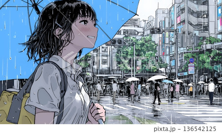 雨の日に傘をさして歩く若い女性