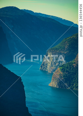 Cruise ship on fjord in Norway Cruise ship on fjord in Norway 136544456