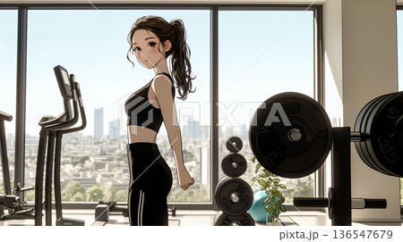 休日にジムで軽く運動する若い女性（シンプルな色使い）