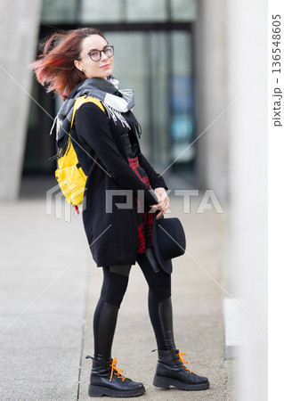 Young woman wearing casual urban fashion accessories Young woman wearing casual urban fashion accessories 136548605