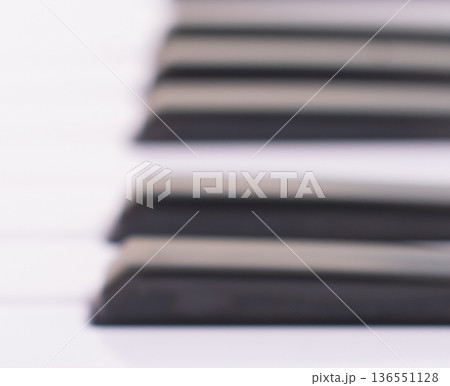 Macro view of piano keys on black background, close up of musical instrument keyboard for classical concert poster, harmony and song composition concept Macro view of piano keys on black background, close up of musical instrument keyboard for classical concert poster, harmony and song composition concept 136551128