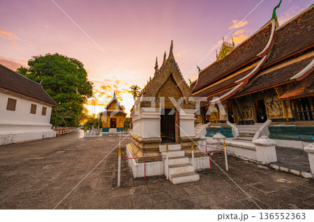Beautiful sky above Wat Xieng Thong in Luang Prabang, Laos Beautiful sky above Wat Xieng Thong in Luang Prabang, Laos 136552363